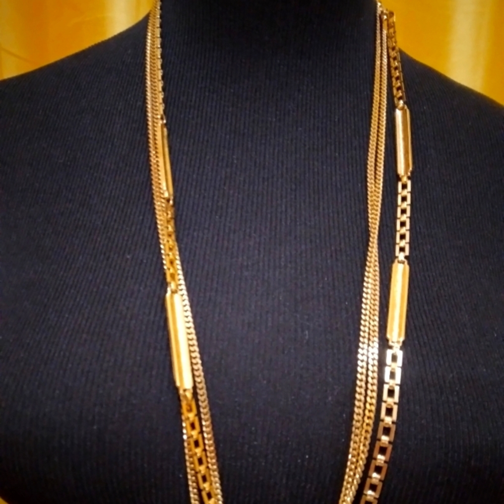 Monet gold tone triple strand necklace